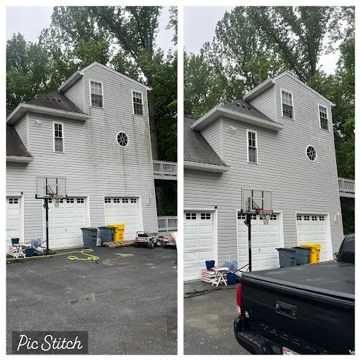 White house with garage, basketball hoop, and truck in driveway