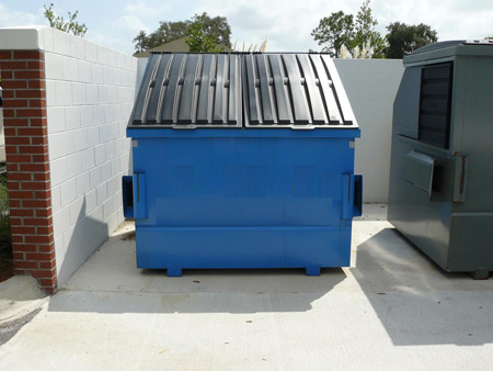 Cleaned dumpster pad area for a commercial business